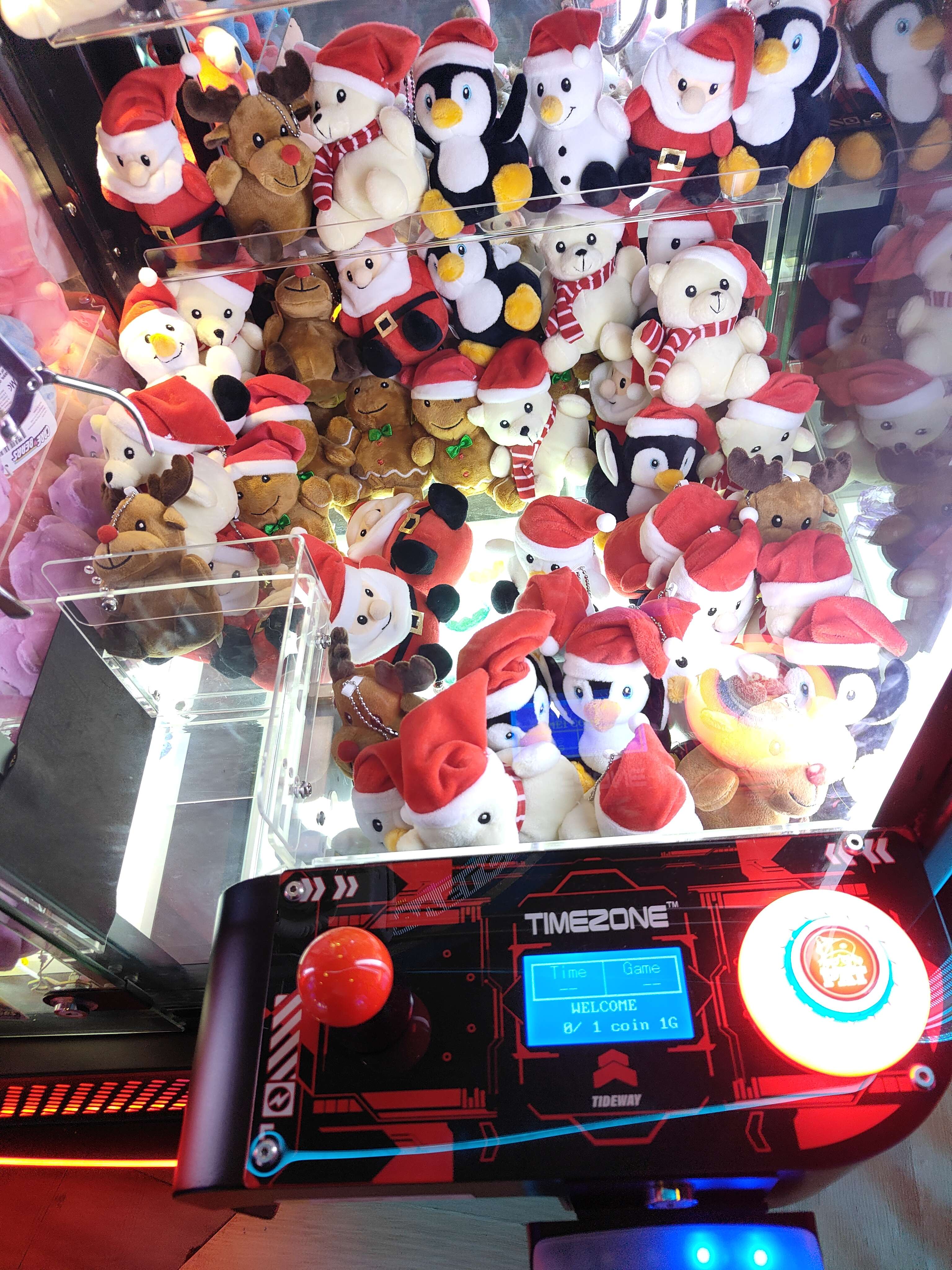 Penguin plushies in claw machine